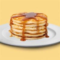 Bg02A. Buttermilk Pancakes (3 Stack) · Fluffy golden pancakes served with butter and syrup.
