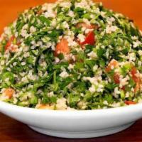 Quinoa Tabule Bowl · Quinoa, parsley, tomatoes, mint and lemon.