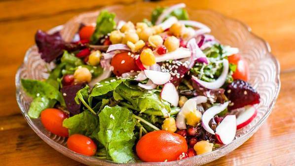 Maya Salad Bowl · Organic mixed greens, beets, cherry tomatoes, onion, chickpeas, radish, sesame and balsamic vinaigrette.