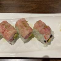 Manhattan Roll · Tuna and avocado, topped with yellowtail, jalapeno and onion with jalapeno citrus sauce.