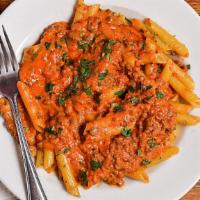 Bolognese Sauce · Our homemade meat sauce with a dash of heavy cream.