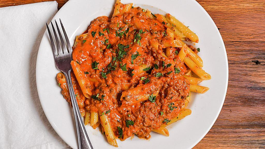 Bolognese Sauce · Our homemade meat sauce with a dash of heavy cream.