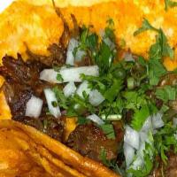 Birria Taco · Short rib taco with cilantro and onions