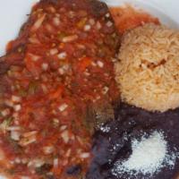 Chiles Rellenos · Stuffed poblano peppers with cheese. Served with rice, beans and tortillas.