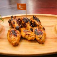 6 Piece Wings · Six flame-grilled wings with your choice of peri peri flavor.