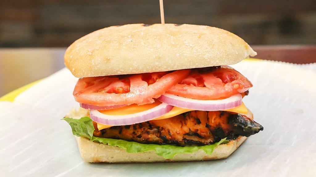 Chicken Sandwich · Chicken tenderloin sandwich with lettuce, tomato and peri mayo.