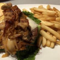 Swiss Burger · Topped with Swiss cheese, mushrooms, caramelized onions, lettuce, tomato, and chipotle ranch...