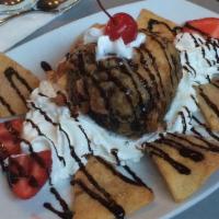 Fried Ice Cream · Our house favorites. Vanilla ice cream coated with our signature tempura
batter which is dee...