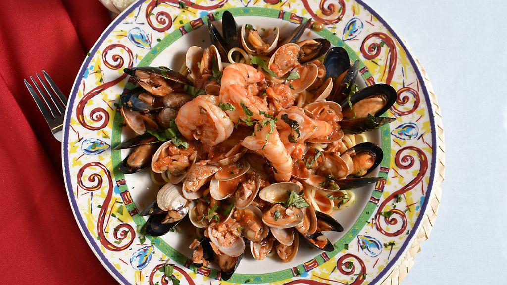 Linguine Porto Fino · Cultivated mussels, new Zealand baby clams, calamari and jumbo shrimp sauteed in choice of marinara, fra diavolo or garlic and virgin olive oil sauce.