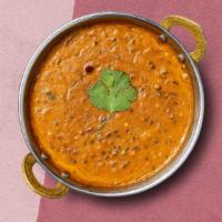 You'Re My Wonder-Dal · Creamy black lentils cooked with tomatoes, onions. Infused with freshly ground spices and bu...
