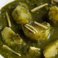 Let Me Count The Ways Aloo-Ve You · Potato cubes cooked in a spinach gravy infused with garlic, ginger & fresh spices. Served wi...