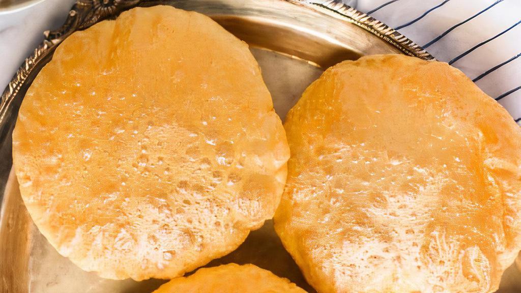 Lookin' So Fry · Fluffy, deep fried Indian bread cooked until golden crisp.