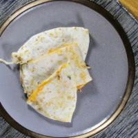 Cheese Quesadilla · flour tortilla, melted monterey jack cheese.  Sour cream and mild salsa served on the side.