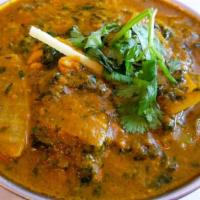 Saag · Choice of meat cooked with fresh spinach and herbs in a mild sauce.