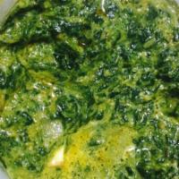 Saag Paneer · Spinach and cheese cooked with mild or hot spices.