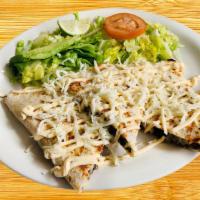 Quesadilla · Flour tortilla stuffed with your choice of meat, cheese topped with sour cream and cheese se...