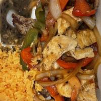 Fajitas · Chicken, steak or shrimp fajita sautéed with green and red peppers, onions. Served with rice...