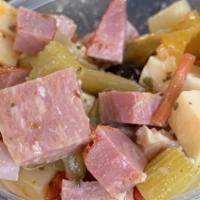 Antipasto Salad Catering · Chopped cured meats, fresh cheeses, and briny olives, supersized for your party.