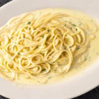 Linguine With Alfredo Sauce · Pasta cooked al dente and tossed in our creamy homemade Alfredo sauce.