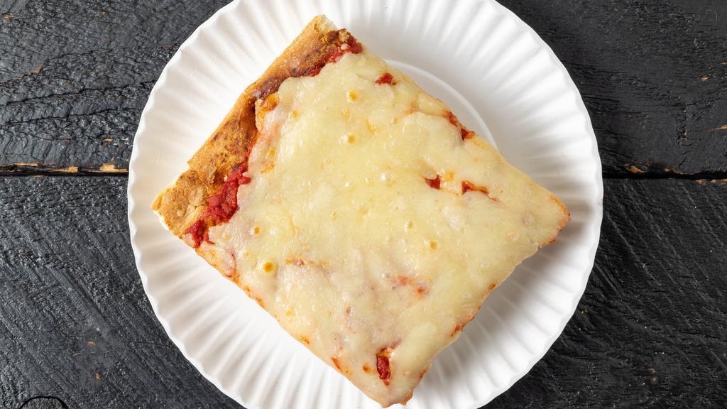 Sicilian Pizza · Thick crust square pizza with tomato sauce, mozzarella and basil.