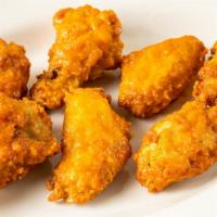 Hot Buffalo Wings · Chicken wings breaded and fried, then tossed in buffalo sauce.