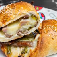 Sausage Roll · Sausage peppers, onions and mozzarella cheese.