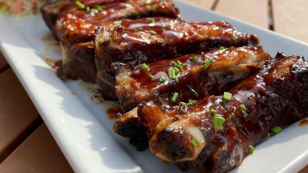 Baby Back Ribs      Half Rack · Cole slaw or vegetables, classic fries