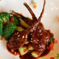 Lamb Tom Yum · Spicy. Grilled lamb chop, steamed bok choy, and broccoli in special tom yum sauce served wit...