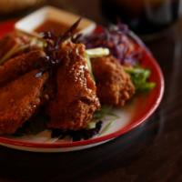 Chicken Wings  · Fried Chicken Wing Served with Sweet  Chili Sauce