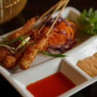 Coconut Shrimp · Fried Shrimp with Coconut Flakes served with Sweet Chili Sauce and Spicy Mayo.