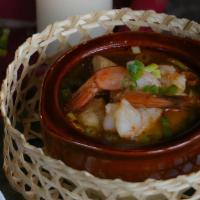 Tom Yum Goong (Spicy Shrimp Soup) · Spicy. Shrimp with galangal, lemongrass, bell peppers, lime leaves, mushrooms, and chili pas...