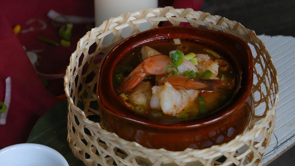 Tom Yum Goong (Spicy Shrimp Soup) · Spicy. Shrimp with galangal, lemongrass, bell peppers, lime leaves, mushrooms, and chili paste.