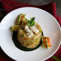 Crab Meat Fried Rice · Gluten-free. Jumbo crab meat, cashew nuts, carrots, egg, onion, and scallions.