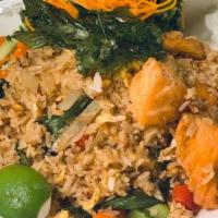 Salmon Basil Fried Rice  · Spicy. Salmon, onion, bell peppers, basil leaves, chili, and egg.
