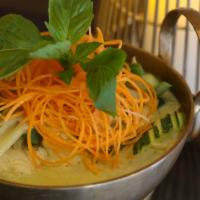 Green Curry · Spicy. Zucchini, string beans, bamboo shoots, bell peppers, and basil leaves in coconut milk.