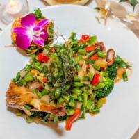 Hot Sweet Basil Duck · Spicy. Crispy duck with basil leaves, bell peppers, string beans, broccoli, and onion in gar...