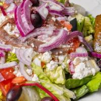 Greek Salad With Jumbo Shrimp (5) · Traditional Greek salad topped with (5)pieces of JUMBO shrimp. Served side of pita bread.