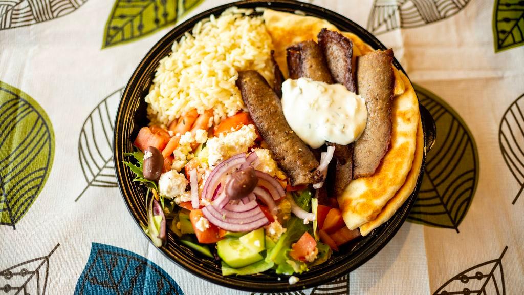 Beef & Lamb Gyro Platter · Served with small salad, rice or french fries with tzatziki sauce and pita bread on the side.