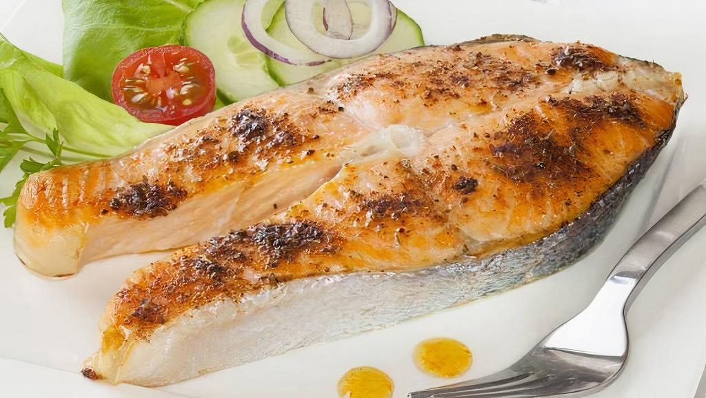 Broiled Filet Of Norwegian Salmon · Norwegian salmon broiled to perfection with olive oil and finished with white wine.