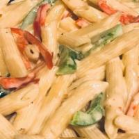 Rasta Pasta · Truly delicious and creamy, Made from our own secret blend of herbs, sweet peppers and  chee...