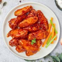 Buffalo Heat Wings · (5 pieces) Fresh chicken wings breaded, fried until golden brown, and tossed in buffalo sauce.