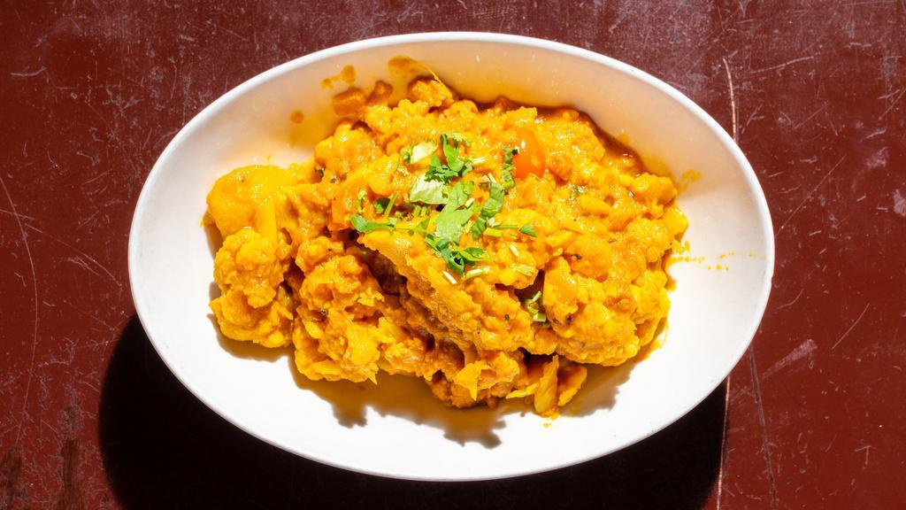 Gobi Japuri · Potato and cauliflower simmered slowly in cumin, coriander and chili flakes.