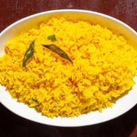 Benarsi Rice · Lemon flavored rice with a hint of peanuts & curry leaves