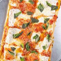 Grandma Square Pizza · Thin crust Sicilian, marinara sauce, fresh mozzarella, olive oil, fresh basil