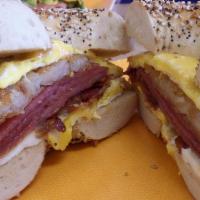 Hangover Helper · Pork roll, bacon, eggs, cheese and hash brown patty on a bagel or roll.