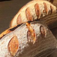 House Sourdough Bread (Whole Loaf) · Naturally leavened bread made fresh daily, made in the style of Tartine Bakery. This bread i...
