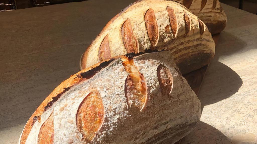 House Sourdough Bread (Whole Loaf) · Naturally leavened bread made fresh daily, made in the style of Tartine Bakery. This bread is one of NY's best kept secrets!