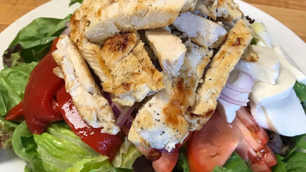 Leonardo’S Salad (Large) · Our tossed salad with crispy chicken breast, shredded mozzarella cheese. Served with creamy Italian dressing on the side.