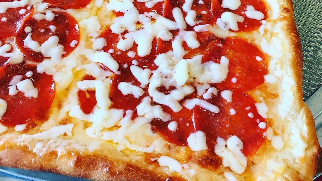 Grandma Pizza · A thin crust square pizza covered with mozzarella and splashed with imported San Marzano tomato sauce.