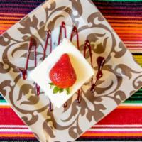Pastel Tres Leches · Home Made Tres Leches Cake Served with Creme Anglaise.